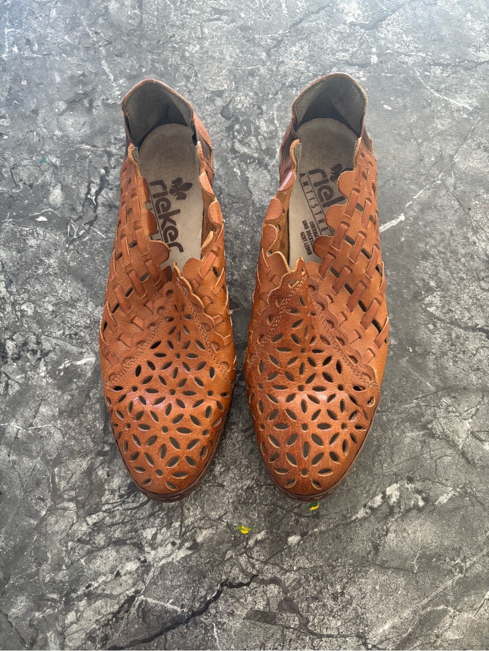 Rieker women’s Brown Laser-Cut Leather Slip-Ons